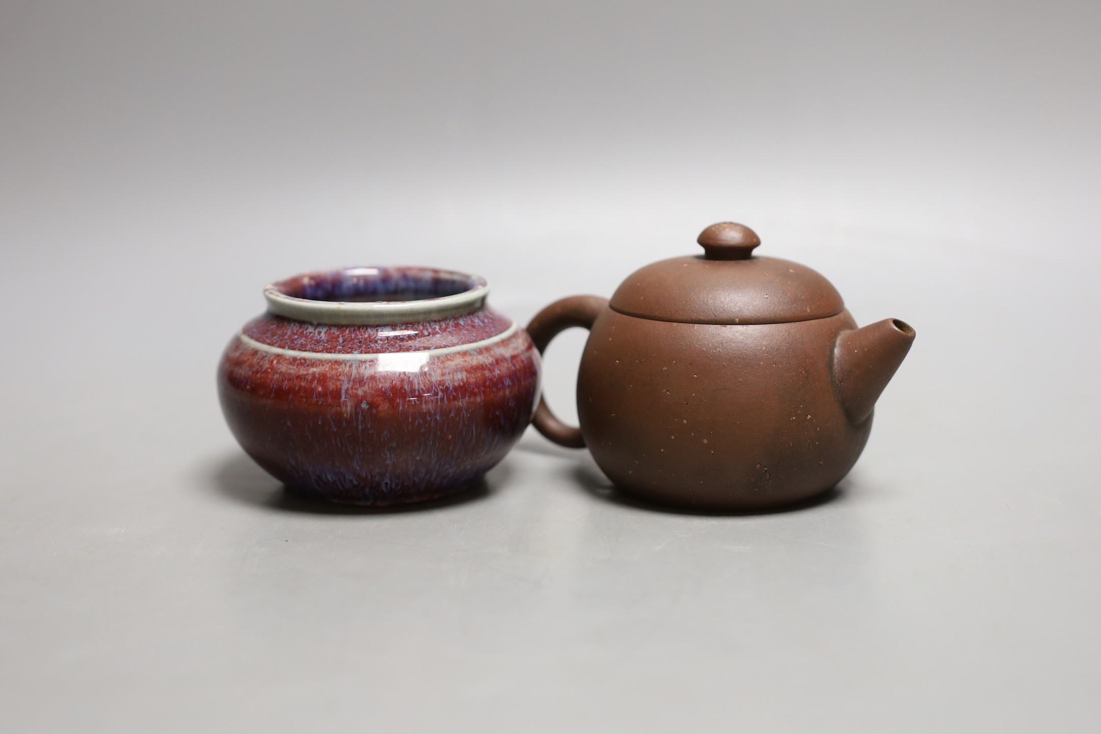 A Chinese flambe waterpot, 6cm tall, and a Yixing teapot